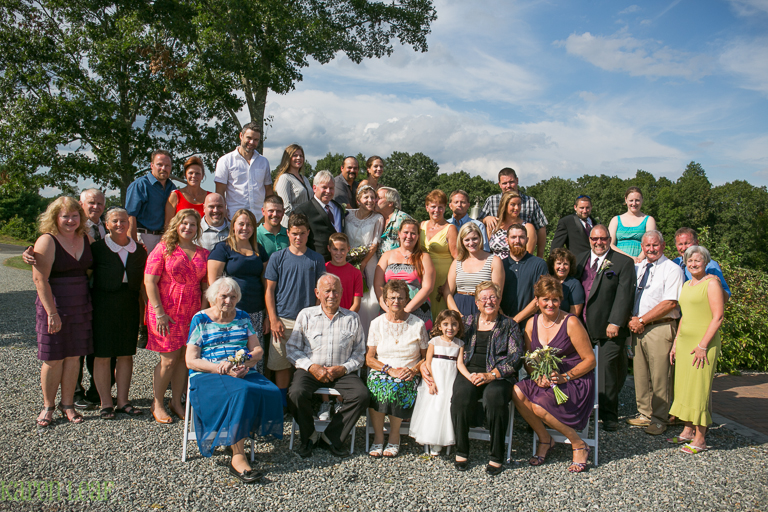 large family group at wedding
